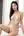 Topless Asian on bed edge