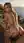 College blonde doggy on cliff balcony