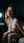 Brunette nude bed edge pose