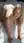 Nude blonde on all fours