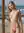 Nude beach doorway pose