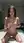 Brunette nude on bedroom mattress