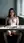 Brunette fingers herself in office