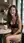 Brunette laughs in cafe lingerie