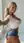 Crop top selfie in bright room