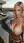 Rooftop lingerie selfie at sunset