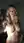Topless blonde studio selfie close-up