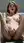 Slim redhead fingers herself in bath