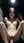 Naked brunette spreads in car