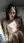 Nude brunette reclines in bath