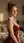 Redhead bedroom over-the-shoulder dress