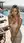 Blonde in linen dress on rooftop