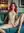 Early 20s redhead spreads on couch