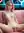 Slim nude body spread on couch