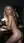 Curvy blonde nude on desk