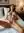 Legs spread fingering on bed