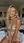 Wavy blonde blue eyes sundress bedroom laugh