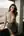 Young adult topless city window