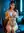 Young Asian nude on neon couch