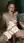 Redhead rides thick dildo on tiles