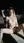 Nude redhead reclines on terrace