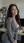 Curvy brunette in open blazer office cleavage