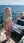 Young adult nude on yacht deck