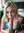 Tatiana — platinum blonde Russian beauty in warm bedroom light