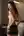 Brunette waves over bare shoulder