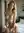 Long wavy blonde topless in bedroom