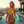 blonde hair yellow bikini rooftop infinity pool sunset