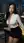 Asian curvy babe leaning over office desk at night