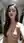 Wavy brunette topless closet selfie