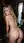 Nude blonde looking back over shoulder