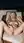 Blonde fingers her wet pussy outdoors