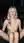 Nude blonde spread on sofa