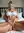 Tatum, blonde fitness model with toned abs in a warm spotlight