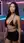 Busty Asian in micro skirt over shoulder glance