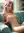 Curvy pink hair nude on couch