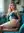 Blonde natural tits on teal couch