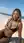 Young adult on beach in lace