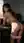 Asian topless bent over desk