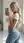 Long wavy platinum blonde blue eyes crop top selfie