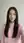 Asian in pink knit sweater selfie