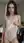 Slim brunette sheer bodysuit tease