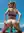 Blonde reverse cowgirl on beach