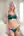 Young adult blonde in teal lingerie