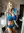 Mila in blue activewear mirror selfie