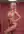 Blonde in pink bikini posing in studio