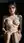 Brunette nude on sofa sunlight
